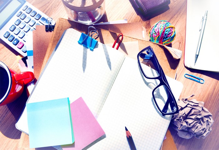 Designer's Desk with Architectural Tools and Notebook